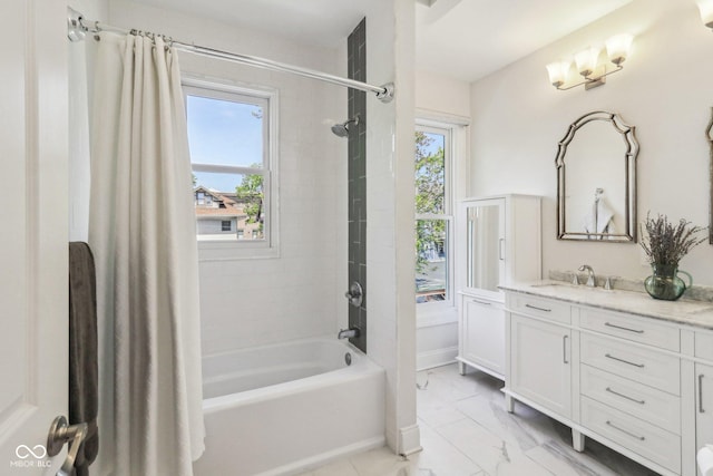 1616 N Delaware St, Indianapolis, IN 46202 - full bath featuring vanity, healthy amount of natural light, marble look tiles, and shower / bath combo