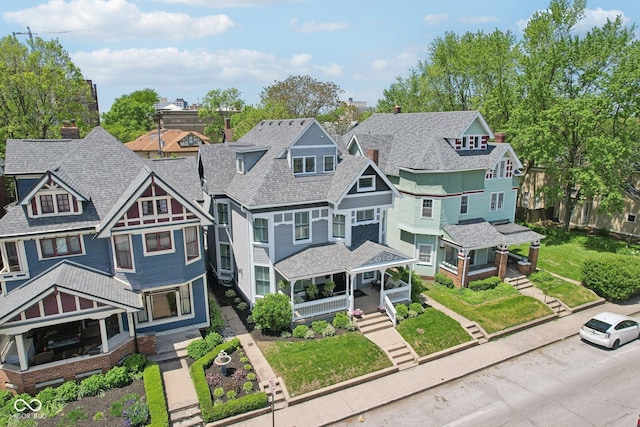 1616 N Delaware St, Indianapolis, IN 46202 - view of front facade with a residential view and covered porch