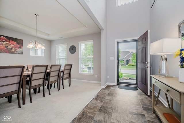 1274 Timber Bluff Rd, Westfield, IN 46074 - foyer with a chandelier, baseboards, marble finish floors, and a raised ceiling