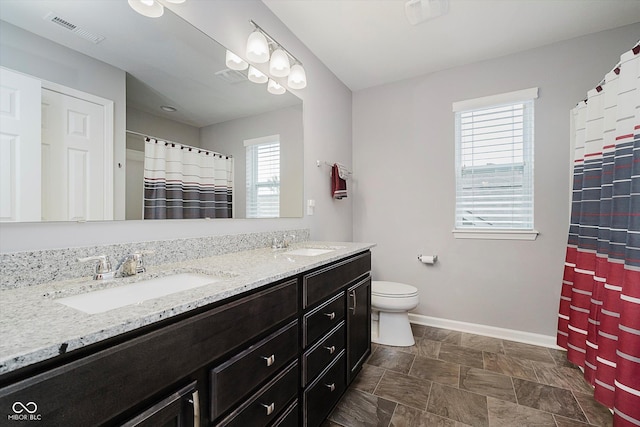 1274 Timber Bluff Rd, Westfield, IN 46074 - full bath with baseboards, double vanity, toilet, and a shower with curtain