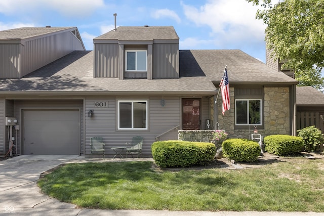 601 Conner Creek Dr, Fishers, IN 46038 - view of front facade with a garage, a shingled roof, driveway, and a front yard
