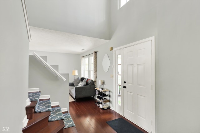 5041 Millwright Ct, Indianapolis, IN 46254 - foyer entrance featuring stairway, hardwood / wood-style floors, and baseboards