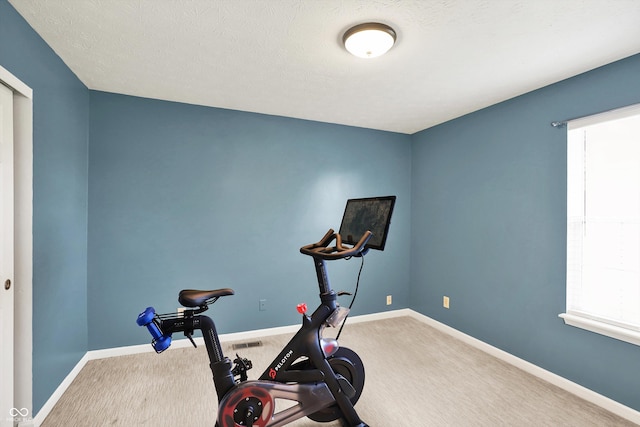5041 Millwright Ct, Indianapolis, IN 46254 - workout room with carpet flooring and baseboards