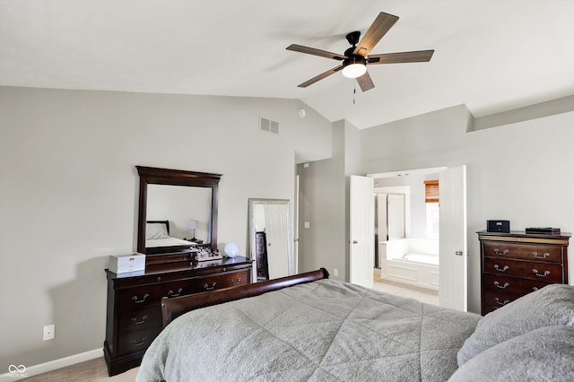 5041 Millwright Ct, Indianapolis, IN 46254 - carpeted bedroom with baseboards, high vaulted ceiling, ensuite bathroom, and a ceiling fan