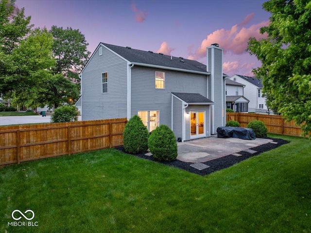 5041 Millwright Ct, Indianapolis, IN 46254 - back of property with a chimney and a patio