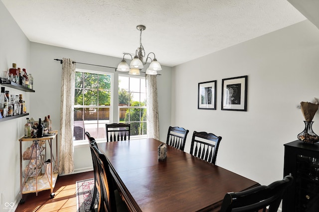 5041 Millwright Ct, Indianapolis, IN 46254 - dining room with a chandelier and wood finished floors