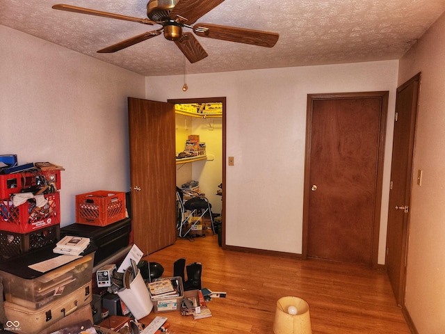 4336 Abby Creek Ln, Indianapolis, IN 46205 - office area with ceiling fan, wood finished floors, and a textured ceiling