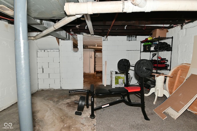 122 E 27th St, Indianapolis, IN 46205 - workout area featuring concrete block wall