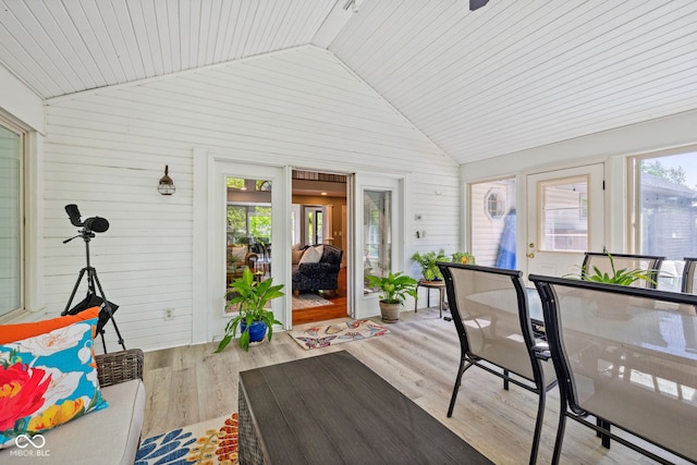8330 Claridge Rd, Indianapolis, IN 46260 - sunroom featuring vaulted ceiling, wooden walls, wood finished floors, and french doors
