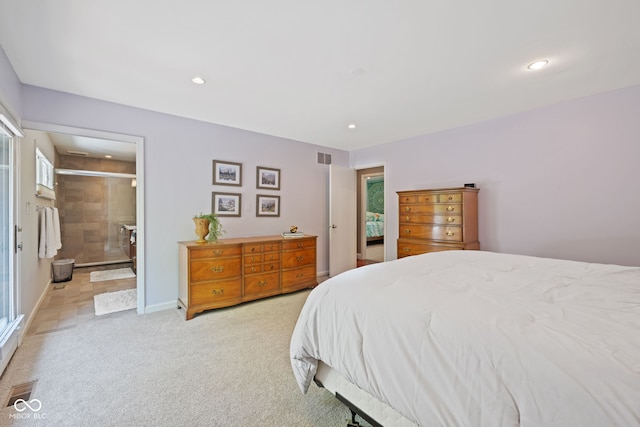 8330 Claridge Rd, Indianapolis, IN 46260 - bedroom featuring multiple windows, light carpet, recessed lighting, ensuite bath, and baseboards