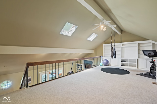 8330 Claridge Rd, Indianapolis, IN 46260 - workout area featuring ceiling fan, carpet floors, lofted ceiling, and a skylight