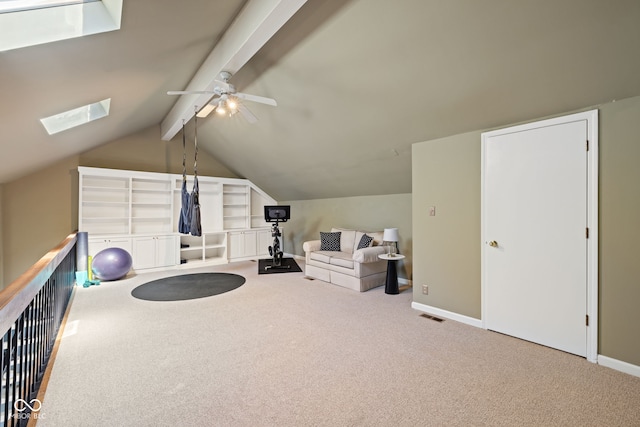 8330 Claridge Rd, Indianapolis, IN 46260 - living area featuring carpet floors, a skylight, a ceiling fan, and baseboards
