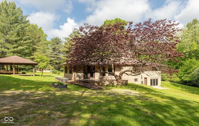 view of grassy yard with a gazebo