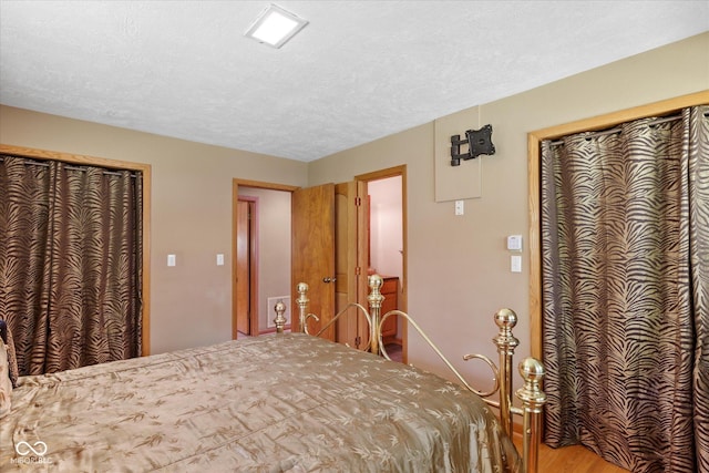 bedroom featuring a textured ceiling