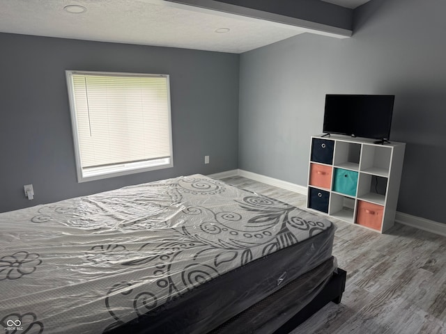 322 S Rural St, Indianapolis, IN 46201 - bedroom featuring light wood-style floors and baseboards