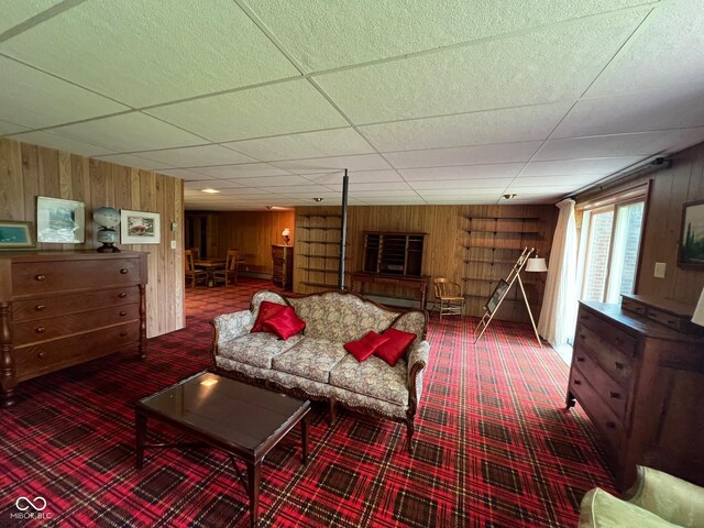 3654 W Mecca Rd, Rockville, IN 47872 - carpeted living area featuring wood walls and a drop ceiling