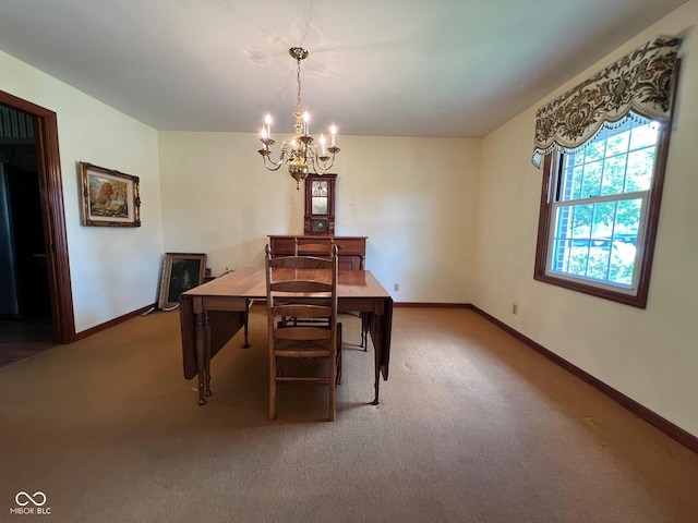 3654 W Mecca Rd, Rockville, IN 47872 - carpeted dining space featuring a chandelier and baseboards