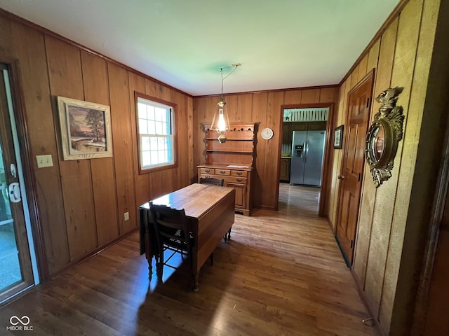 3654 W Mecca Rd, Rockville, IN 47872 - dining area with crown molding, wood finished floors, and wooden walls