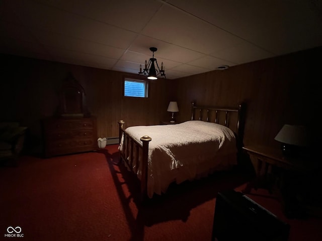 3654 W Mecca Rd, Rockville, IN 47872 - bedroom featuring carpet flooring, wood walls, a drop ceiling, and a baseboard radiator