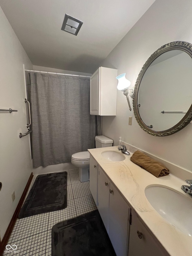 3654 W Mecca Rd, Rockville, IN 47872 - full bath with toilet, double vanity, curtained shower, and tile patterned flooring