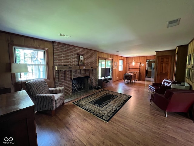 3654 W Mecca Rd, Rockville, IN 47872 - living area with a fireplace, wood finished floors, and wood walls