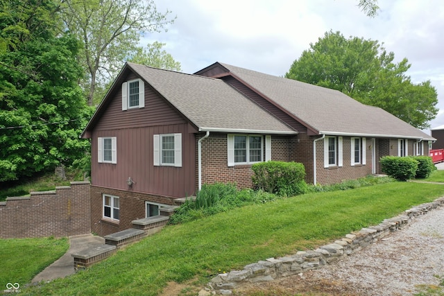 3654 W Mecca Rd, Rockville, IN 47872 - view of side of home with brick siding, a lawn, and roof with shingles