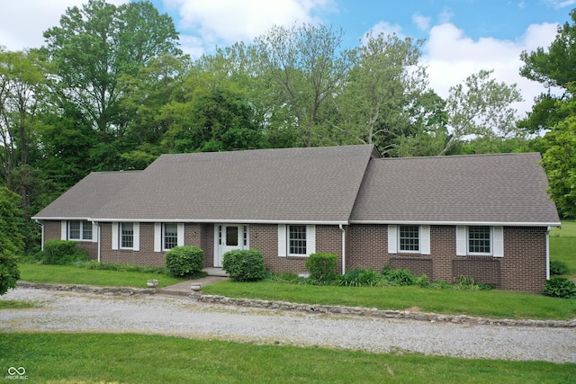 3654 W Mecca Rd, Rockville, IN 47872 - view of front of property featuring brick siding, a front yard, and a shingled roof