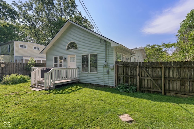 1802 E 66th St, Indianapolis, IN 46220 - rear view of property with a wooden deck