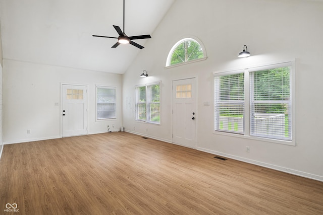 1802 E 66th St, Indianapolis, IN 46220 - entryway featuring high vaulted ceiling, a ceiling fan, light wood-style floors, and plenty of natural light