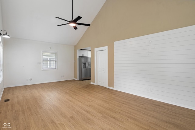 1802 E 66th St, Indianapolis, IN 46220 - empty room featuring high vaulted ceiling, a ceiling fan, and light wood-style flooring