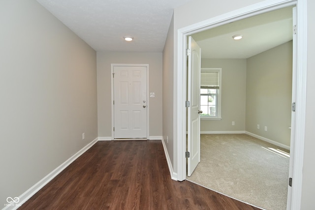 8354 Fieldfare Way, Indianapolis, IN 46237 - corridor featuring baseboards and dark wood-style floors