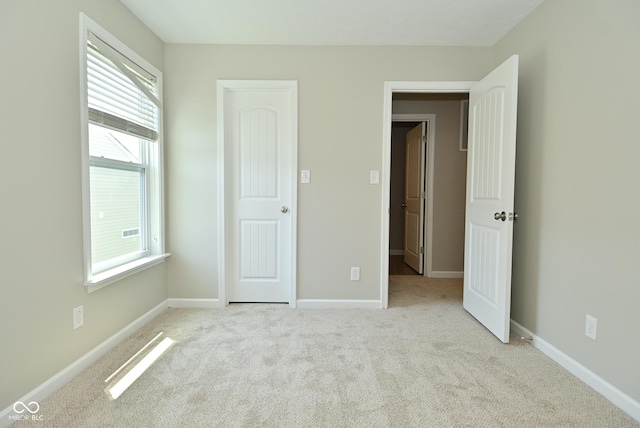 8354 Fieldfare Way, Indianapolis, IN 46237 - unfurnished bedroom featuring carpet and baseboards