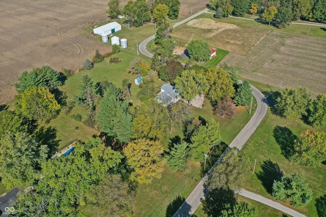 aerial view of property and surrounding area featuring rural landscape