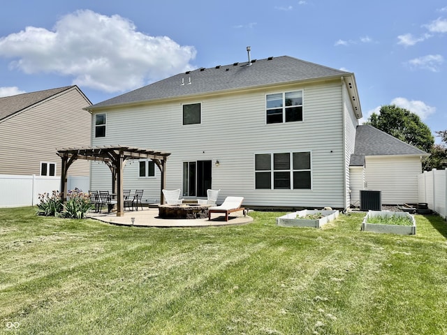 rear view of property with central AC, a pergola, a patio, a fire pit, and a garden