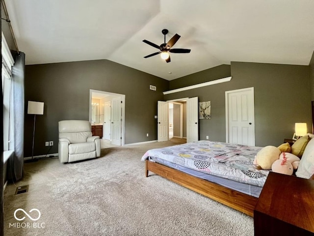 carpeted bedroom with lofted ceiling, baseboards, and a ceiling fan