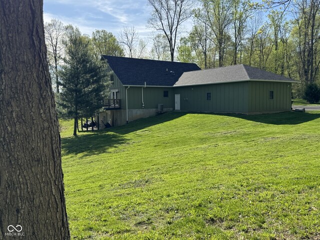 1340 Apache Trl, Martinsville, IN 46151 - rear view of house with a yard and roof with shingles