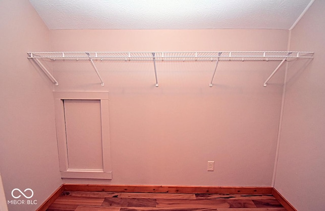 1340 Apache Trl, Martinsville, IN 46151 - walk in closet featuring wood finished floors
