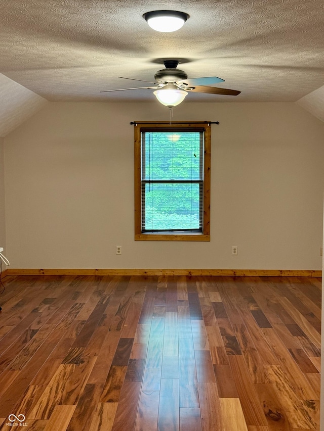 1340 Apache Trl, Martinsville, IN 46151 - bonus room with ceiling fan, vaulted ceiling, wood finished floors, a textured ceiling, and baseboards