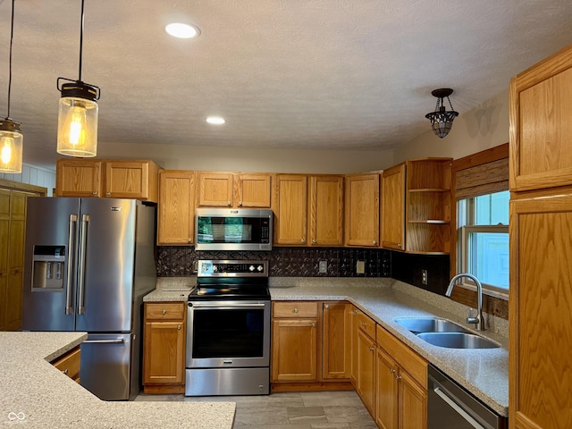 1340 Apache Trl, Martinsville, IN 46151 - kitchen featuring appliances with stainless steel finishes, a sink, backsplash, light countertops, and recessed lighting