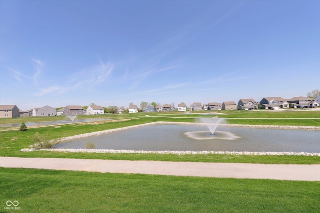 9570 Beckett St, Avon, IN 46123 - view of community featuring a residential view, a yard, and a water view
