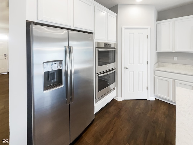 18230 Sandy Cove Ln, Westfield, IN 46074 - kitchen with stainless steel appliances, dark wood-style floors, and white cabinetry
