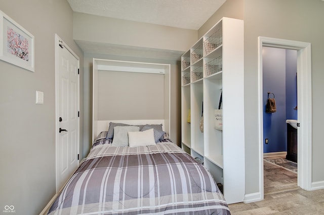 1009 Broadway St, Indianapolis, IN 46202 - bedroom featuring wood finished floors and baseboards