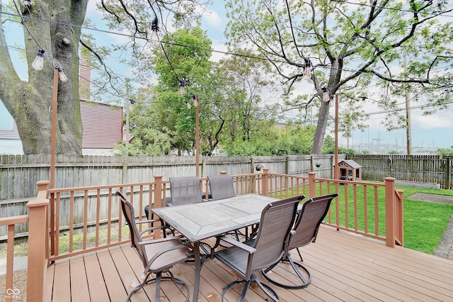 1009 Broadway St, Indianapolis, IN 46202 - deck featuring outdoor dining space, an outdoor structure, and a shed