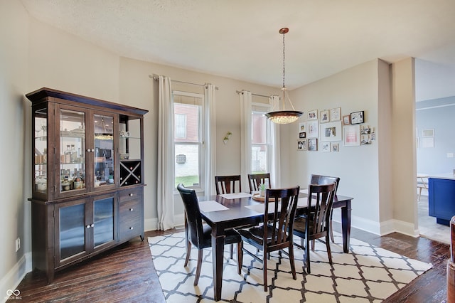1009 Broadway St, Indianapolis, IN 46202 - dining area featuring dark wood-type flooring and baseboards