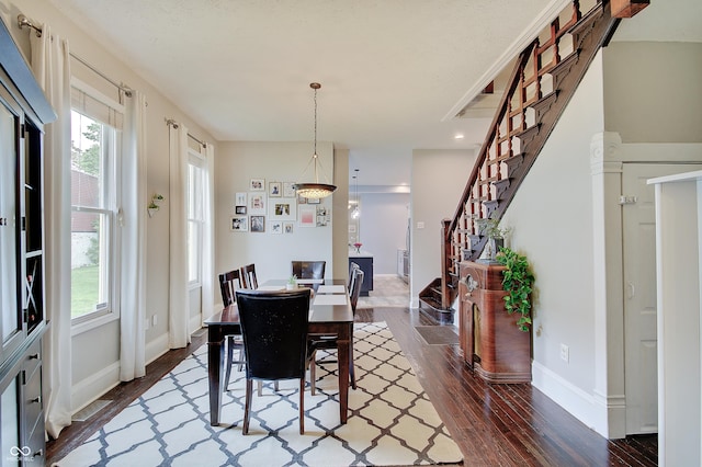 1009 Broadway St, Indianapolis, IN 46202 - dining space with stairs, dark wood-style floors, plenty of natural light, and recessed lighting