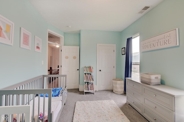 1009 Broadway St, Indianapolis, IN 46202 - bedroom featuring light carpet and a nursery area