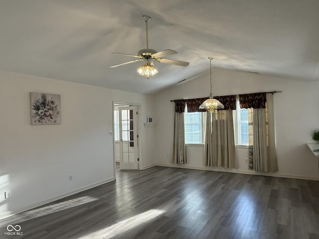 11523 Coastal Way, Indianapolis, IN 46229 - unfurnished room with dark wood-style flooring, a ceiling fan, a chandelier, lofted ceiling, and baseboards