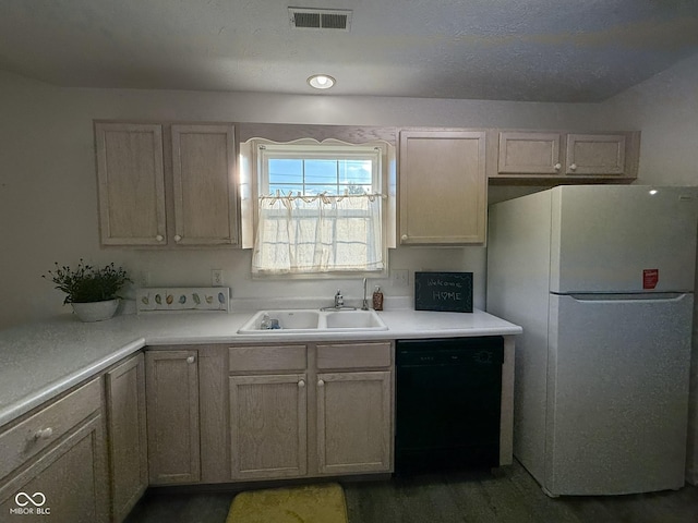 11523 Coastal Way, Indianapolis, IN 46229 - kitchen featuring freestanding refrigerator, dishwasher, a sink, and light countertops