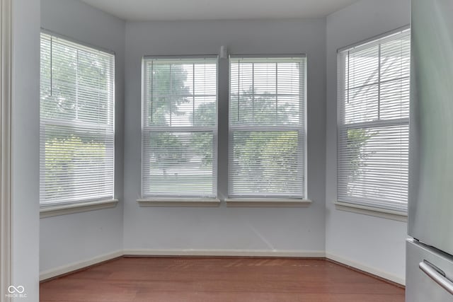 6542 E Edna Mills Dr, Camby, IN 46113 - unfurnished dining area featuring wood finished floors and baseboards