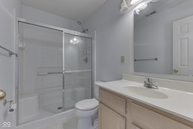 6542 E Edna Mills Dr, Camby, IN 46113 - full bathroom with a shower stall, vanity, toilet, and tile patterned flooring